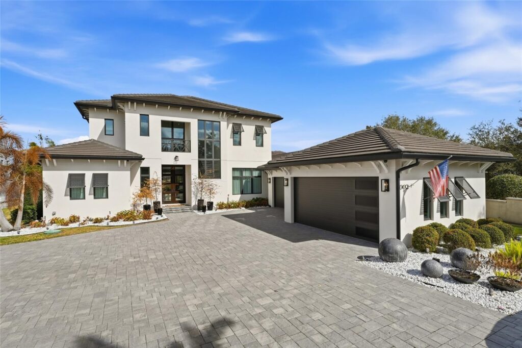 Imoveis 1 Casa de luxo à venda em Windermere no Butler Chain of Lakes com vista para o lago, piscina estilo resort e dock privativo